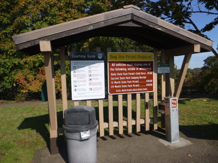 Informational kiosk at visitor center &ndash; pay station for day use permit &ndash;  courtesy guide rules &ndash; garbage can