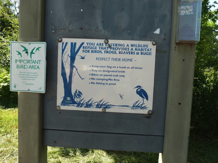 Wildlife refuge rules at north parking lot – leash dogs – bikes on paved trails only Wildlife refuge rules at north parking lot – leash dogs – bikes on paved trails only