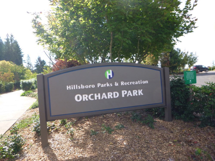 Covered picnic area off hard surface trail &ndash; picnic tables at shelter and on grass &ndash; trash can