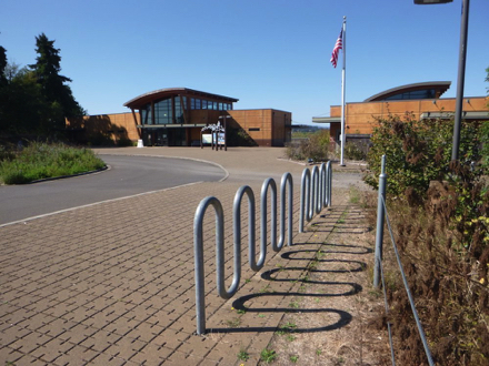 Bike rack in main parking lot - walkway of concrete pavers - refuge headquarters - Wildlife Center Bike rack in main parking lot - walkway of concrete pavers - refuge headquarters - Wildlife Center