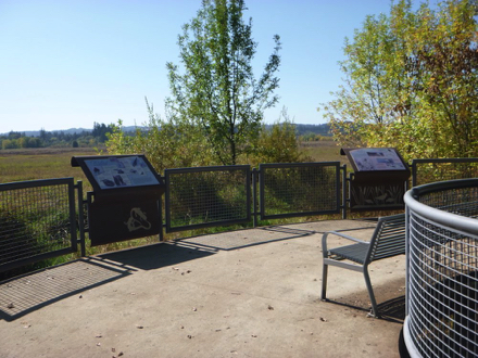 Wetland Observation Deck overlooking wetland - see-through metal railing - metal benches - interpretive displays Wetland Observation Deck overlooking wetland - see-through metal railing - metal benches - interpretive displays