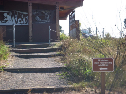 Cutoff Trail with wide steps filled with gravel from seasonal trail to the restroom and parking lot Cutoff Trail with wide steps filled with gravel from seasonal trail to the restroom and parking lot